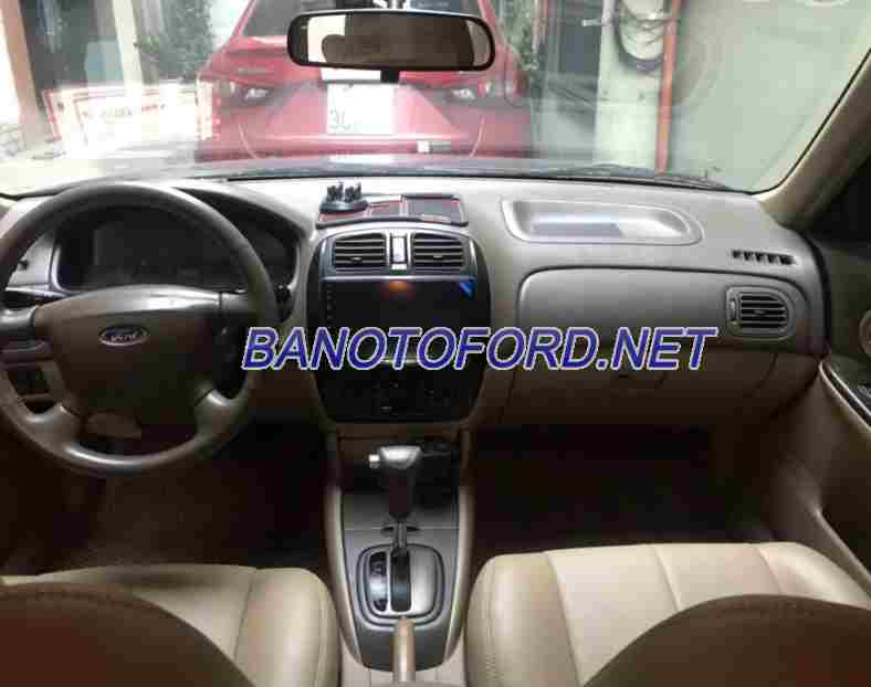 Cần bán xe Ford Laser GHIA 1.8 AT màu Đen 2003