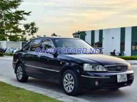 Cần bán gấp Ford Laser GHIA 1.8 MT đời 2004, màu Đen